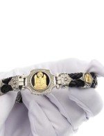 Браслет из серебра 925 пробы и золота 750 пробы c кожаным шнурком и ониксом