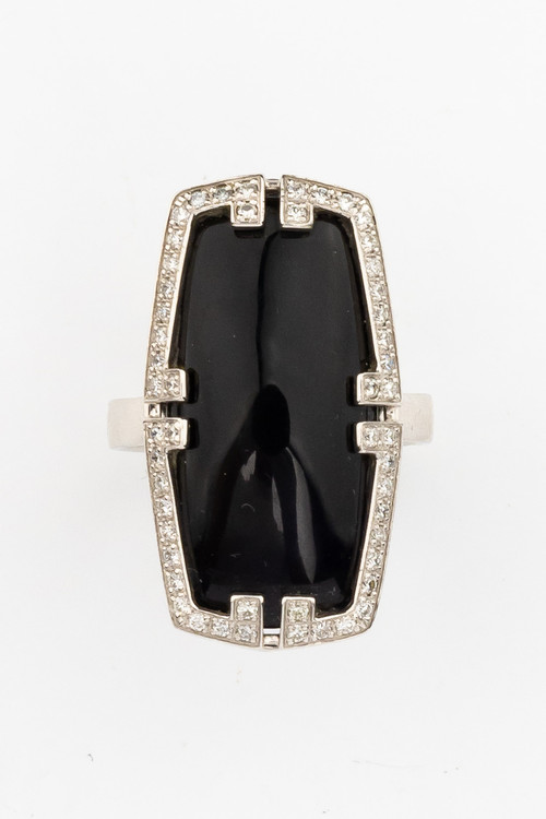 Кольцо из белого золота c бриллиантами, рубином и ониксом