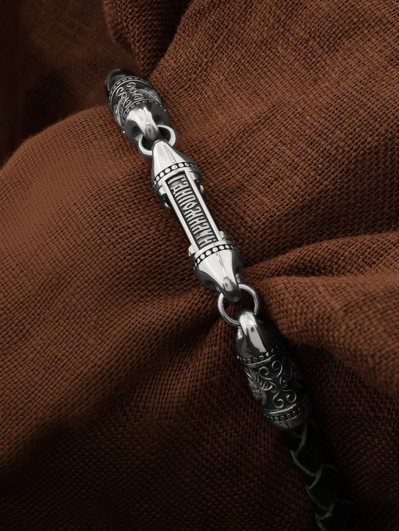 Браслет из белого золота c кожаным шнурком и ониксом