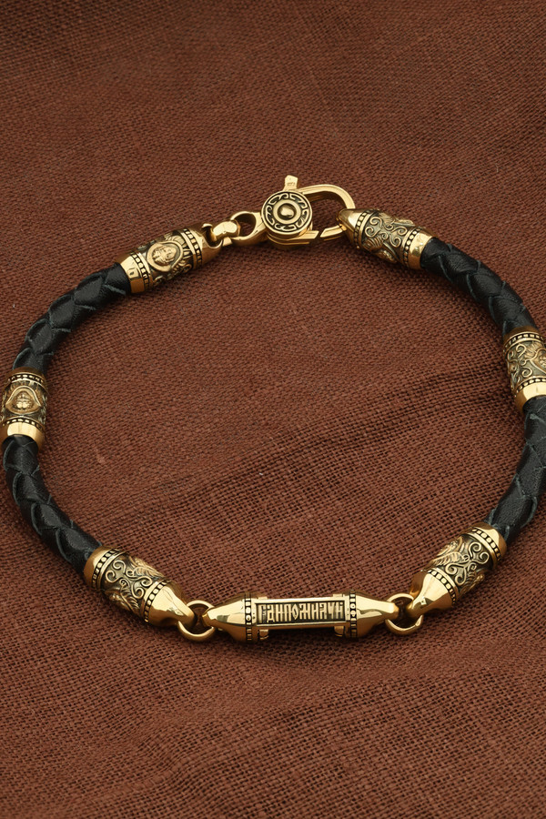 Браслет из лимонного золота c кожаным шнурком и ониксом