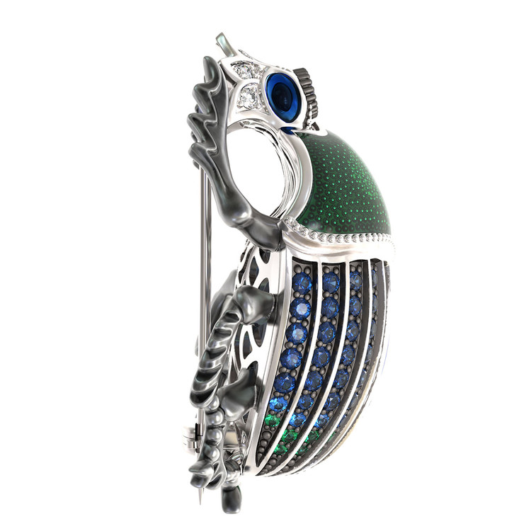 Брошь из белого золота c эмаль , фианитом и сапфиром