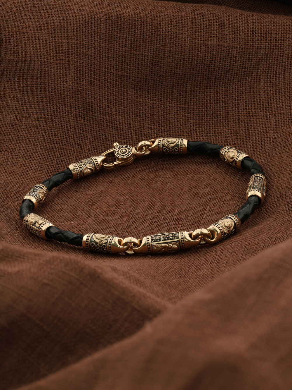 Браслет из золота c кожаным шнурком